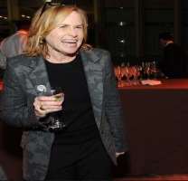 Amy Madigan consuming alcohol